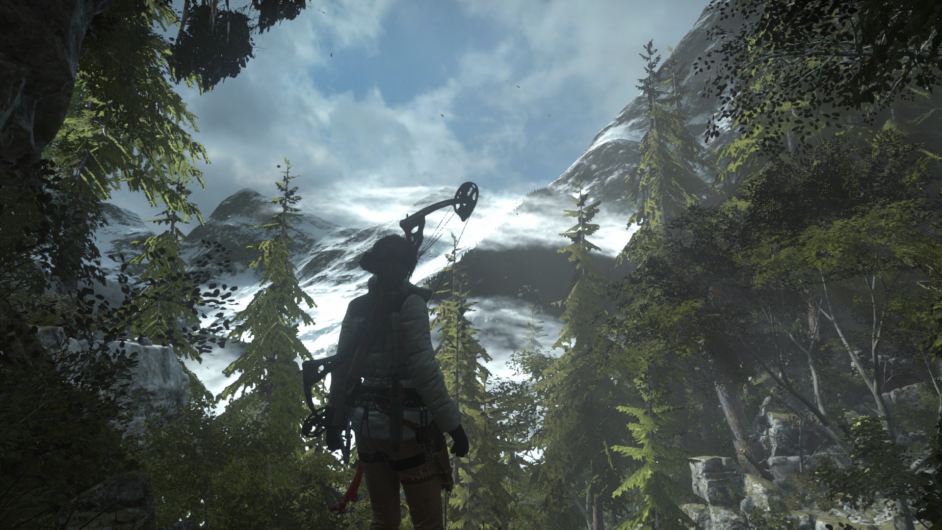 Lara looks out at snow capped mountains