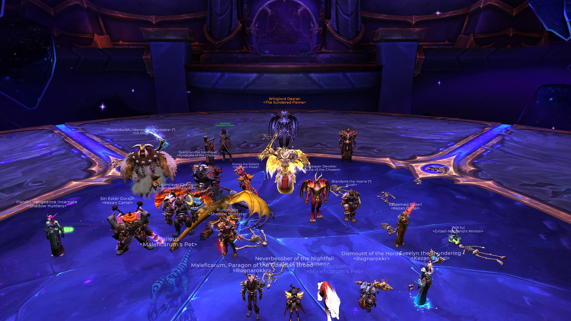 The raid team standing in front of the defeated final boss